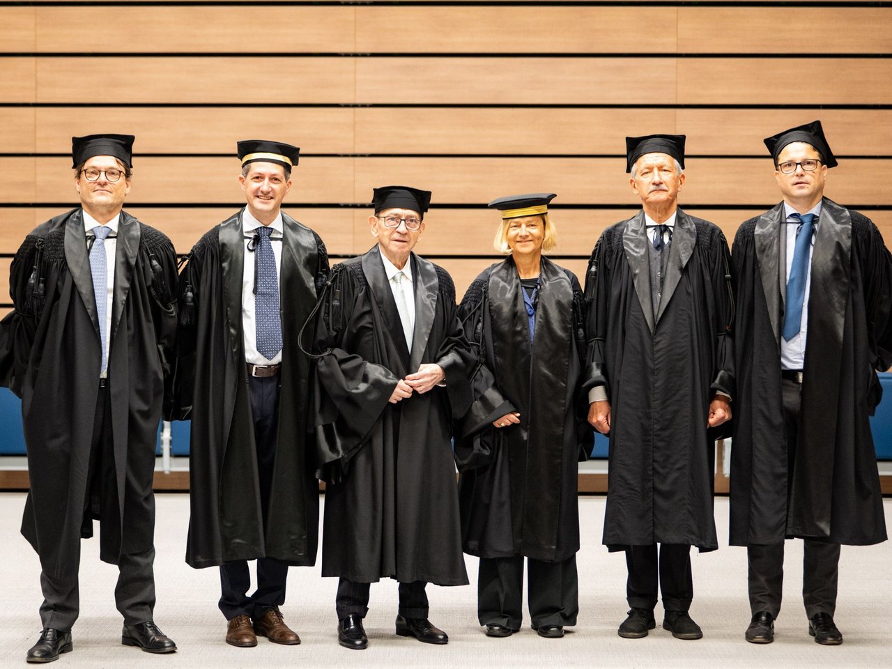 Ernesto Colnago with graduation committee class=
